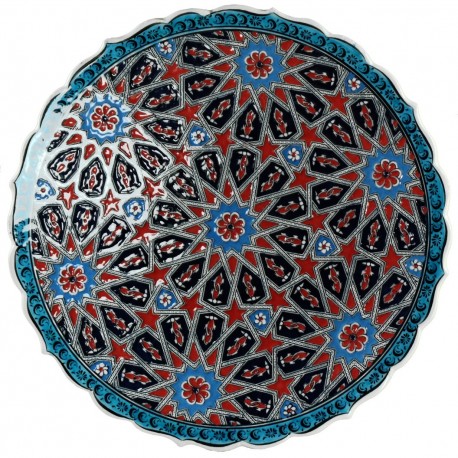 Plat ethnique Melis Rouge et Bleu 30cm à bords chantournés et motifs géométriques orientaux
